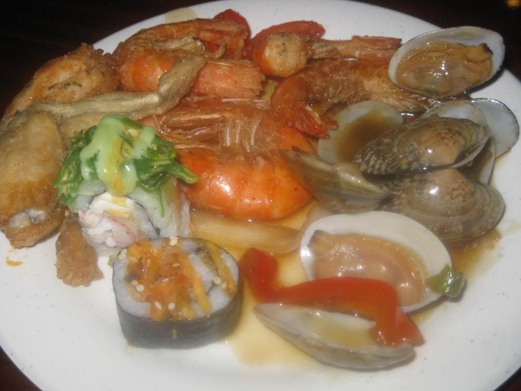 Hibachi #dinner #plate number 3: Delicious #froglegs alongside more #sushi, #baby #clams in #black #bean #sauce, and sliced #redpepper - DrewryNewsNetwork.com